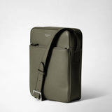 Front view: NORTH SOUTH CROSSBODY BAG IN CACHEMIRE LEATHER stands upright against a light background, leaf-green tone, adjustable shoulder strap across the front, fine leather grain; logo: SERAPIAN MILANO