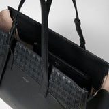 Close-up: MAXI MARO BAG IN CACHEMIRE LEATHER AND MOSAICO, open black tote bag with Mosaico woven pattern, knotted nappa leather strips on the sides and an internal zip pocket. Visible lettering: SERAPIAN MILANO