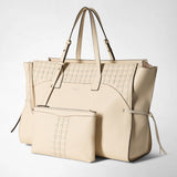 Front view: MAXI MARO BAG IN CACHEMIRE LEATHER AND MOSAICO shows a cream, spacious tote with a Mosaico weave, knotted nappa-leather strips at the sides, and a matching zip pocket.