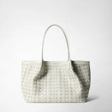 Frontal view: SMALL SECRET TOTE BAG IN MOSAICO AND ELAPHE, presented in studio; moon grey woven Mosaico nappa leather with Elaphe inserts, two long handles, visible 'SERAPIAN' logo.
