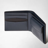 Frontal view: 3-CARD BILLFOLD WALLET WITH COIN POUCH IN MOSAICO shows an open navy blue leather wallet with three card slots, a coin pouch, and two note sleeves. Text reads: MADE IN ITALY.