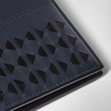 Detail view: 3-CARD BILLFOLD WALLET WITH COIN POUCH IN MOSAICO shows a close-up of navy blue nappa leather with geometric hand-woven Mosaico pattern.