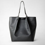 Front view of the VERTICAL SECRET TOTE BAG IN STEPAN, a large asphalt gray tote bag with textured Stepan canvas, black leather handles, and visible Serapian logo.