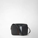Front view: the CAMERA CROSSBODY BAG IN STEPAN features an embossed pattern, gray leather details, and a shoulder strap; “SERAPIAN MILANO” is visible.